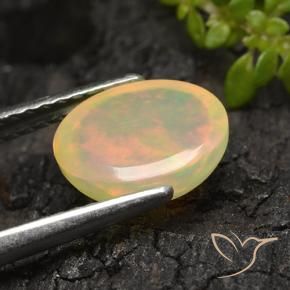 Натуральный Многоцветный Опал 1,44 карата Огранка Овал, Полупрозрачный