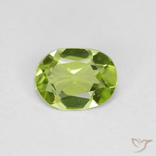 0.71ct Натуральный Ярко-зеленый Перидот, Овал, Чистота VS