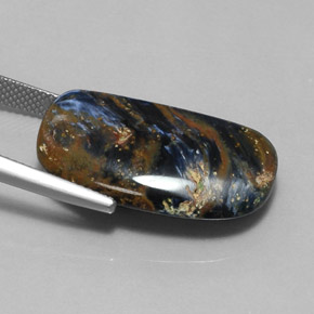 Натуральный многоцветный питерсит 17,00 карата необычная форма, непрозрачный