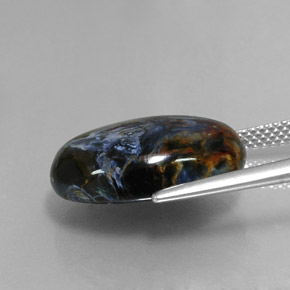 Натуральный многоцветный питерсит 11,36 карата огранка овал, непрозрачный