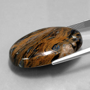 Натуральный многоцветный питерсит 36,42 карата огранка овал, непрозрачный