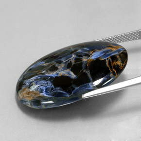 Натуральный многоцветный питерсит 21,39 карата огранка овал, непрозрачный