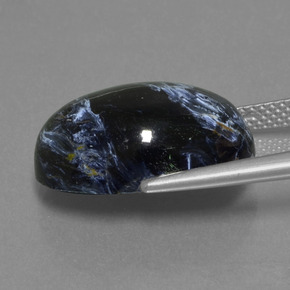 Натуральный многоцветный питерсит 12,22 карата огранка овал, непрозрачный