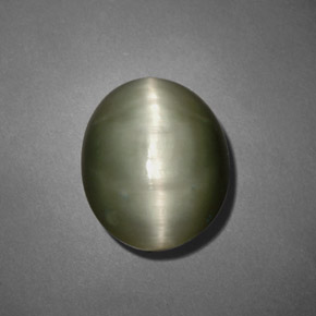 Натуральный зелёный quartz cat's eye 7,45 карата огранка овал, непрозрачный