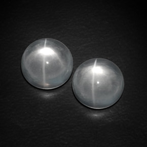 Натуральный белый quartz cat's eye  карата огранка круг, прозрачный