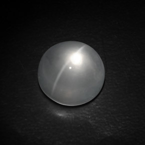 Натуральный белый quartz cat's eye 10,71 карата огранка круг, прозрачный