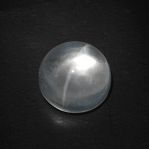 Натуральный белый quartz cat's eye 9,89 карата огранка круг, прозрачный