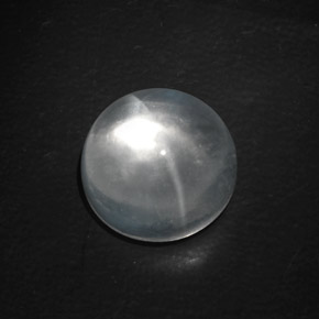 Натуральный белый quartz cat's eye 9,89 карата огранка круг, прозрачный
