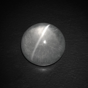 Натуральный белый quartz cat's eye 9,02 карата огранка круг, прозрачный