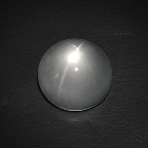 Натуральный белый quartz cat's eye 9,90 карата огранка круг, прозрачный