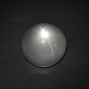 Натуральный белый quartz cat's eye 9,90 карата огранка круг, прозрачный