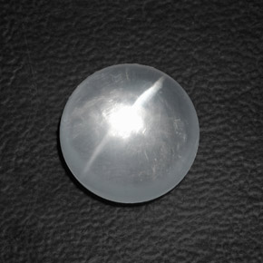 Натуральный белый quartz cat's eye 8,82 карата огранка круг, прозрачный
