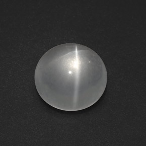 Натуральный белый quartz cat's eye 7,54 карата огранка круг, прозрачный