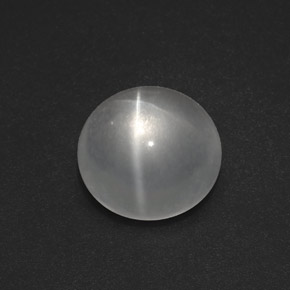 Натуральный белый quartz cat's eye 7,54 карата огранка круг, прозрачный