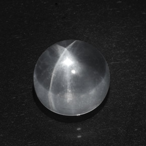 Натуральный белый quartz cat's eye 6,95 карата огранка круг, прозрачный