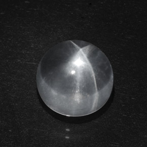 Натуральный белый quartz cat's eye 6,95 карата огранка круг, прозрачный
