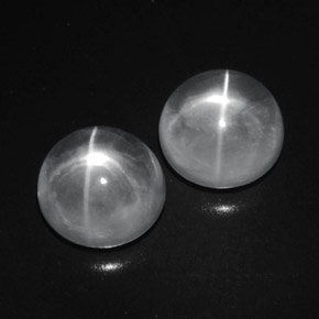 Натуральный белый quartz cat's eye 9,41 карата огранка круг, прозрачный