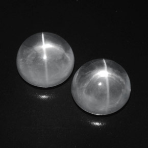 Натуральный белый quartz cat's eye 9,41 карата огранка круг, прозрачный