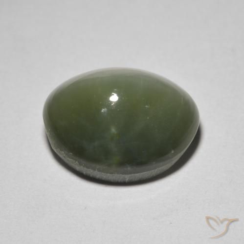 Натуральный зелёный quartz cat's eye 5,26 карата огранка овал, непрозрачный