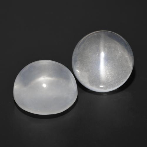 Натуральный белый quartz cat's eye 13,12 карата огранка круг, прозрачный