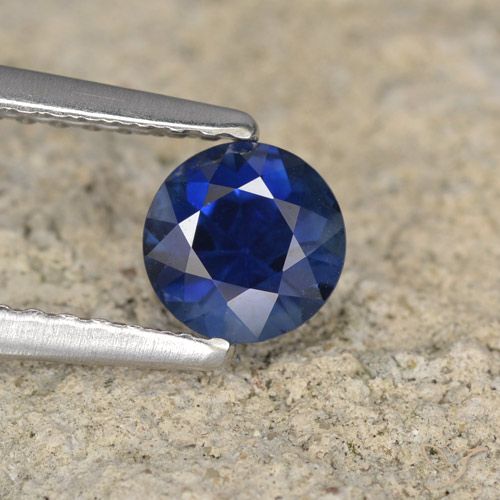 0.69ct Натуральный Темно-синий Сапфир, Круглый, Чистота VS