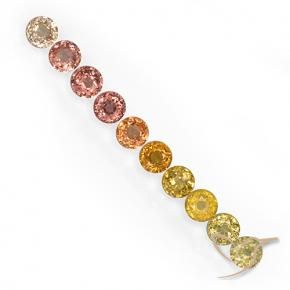 Натуральный многоцветный сапфир 3,57 карата огранка круг, чистота VS