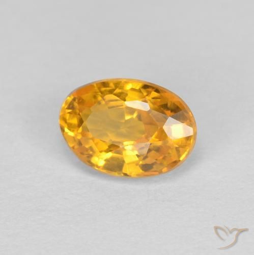 0.60 карата, натуральный Оранжево-золотой Сапфир, Овал, Чистота VVS