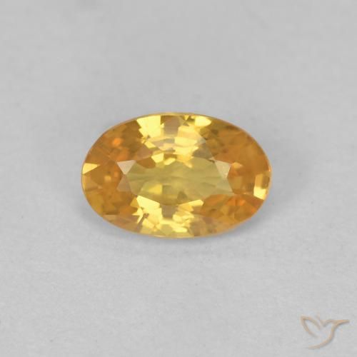 0.57ct Натуральный Темно-золотой апельсин Сапфир, Овал, Чистота VS