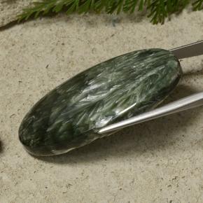 47.08 карата, натуральный Зеленый различных оттенков Серафинит, Огранка Овал, Непрозрачный