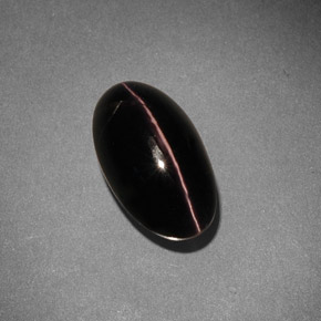 Натуральный коричневый sillimanite cat's eye 5,42 карата огранка овал, непрозрачный