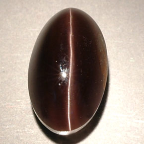 Натуральный коричневый sillimanite cat's eye 4,63 карата прозрачный, полупрозрачный