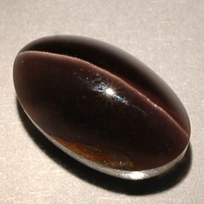 Натуральный коричневый sillimanite cat's eye 4,63 карата прозрачный, полупрозрачный