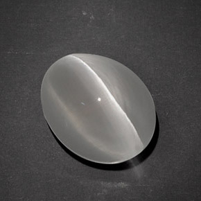Натуральный серый sillimanite cat's eye 7,96 карата огранка овал, полупрозрачный