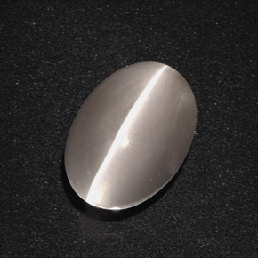 Натуральный серый sillimanite cat's eye 5,66 карата огранка овал, полупрозрачный