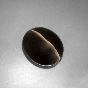 Натуральный серый sillimanite cat's eye 4,11 карата прозрачный, полупрозрачный