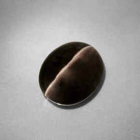 Натуральный серый sillimanite cat's eye 4,11 карата прозрачный, полупрозрачный
