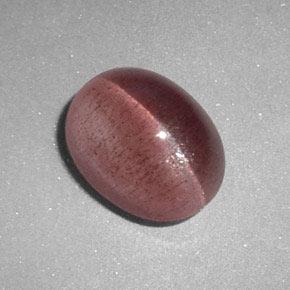 Натуральный розовый sillimanite cat's eye 2,89 карата огранка овал, полупрозрачный