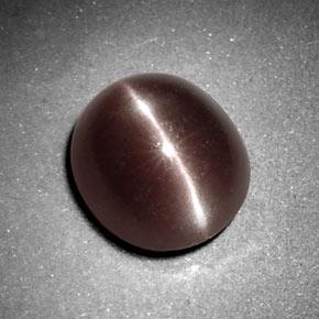 Натуральный коричневый sillimanite cat's eye 3,29 карата огранка овал, непрозрачный