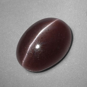 Натуральный коричневый sillimanite cat's eye 3,47 карата огранка овал, непрозрачный