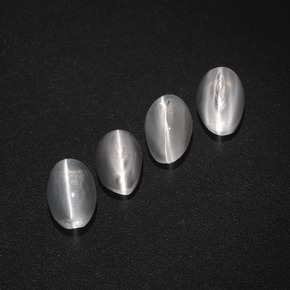 Натуральный дымчатый sillimanite cat's eye  карата огранка овал, полупрозрачный