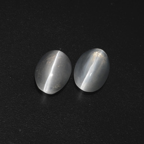 Натуральный серый sillimanite cat's eye 2,32 карата огранка овал, полупрозрачный
