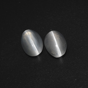 Натуральный серый sillimanite cat's eye 2,32 карата огранка овал, полупрозрачный