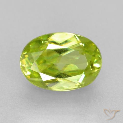 0.77ct Натуральный Ярко-зеленый Сфен, Овал, Чистота VS