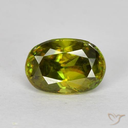 0.73ct Натуральный Травянисто-зелёный Сфен, Овал, Чистота VS