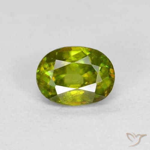 0.57ct Натуральный Medium Dark-Green Сфен, Овал, VVS-VS