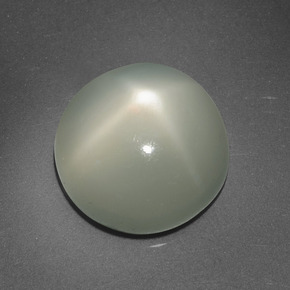 Натуральный кремовый звёздчатый лунный камень 6,95 карата огранка круг, полупрозрачный
