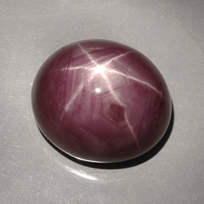 Натуральный красный звёздчатый рубин 42,66 карата огранка овал, непрозрачный