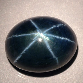12.02 карата, натуральный Синий / Голубой Звездчатый сапфир, Огранка Овал, Полупрозрачный