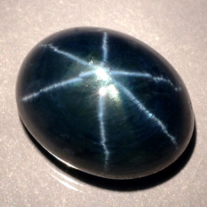 12.02 карата, натуральный Синий / Голубой Звездчатый сапфир, Огранка Овал, Полупрозрачный