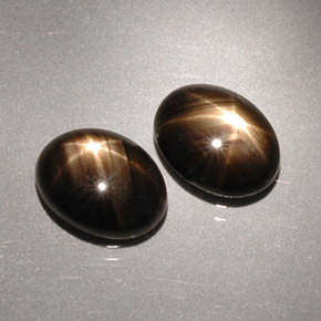  карата, натуральный Черный Звездчатый сапфир, Огранка Овал, Непрозрачный